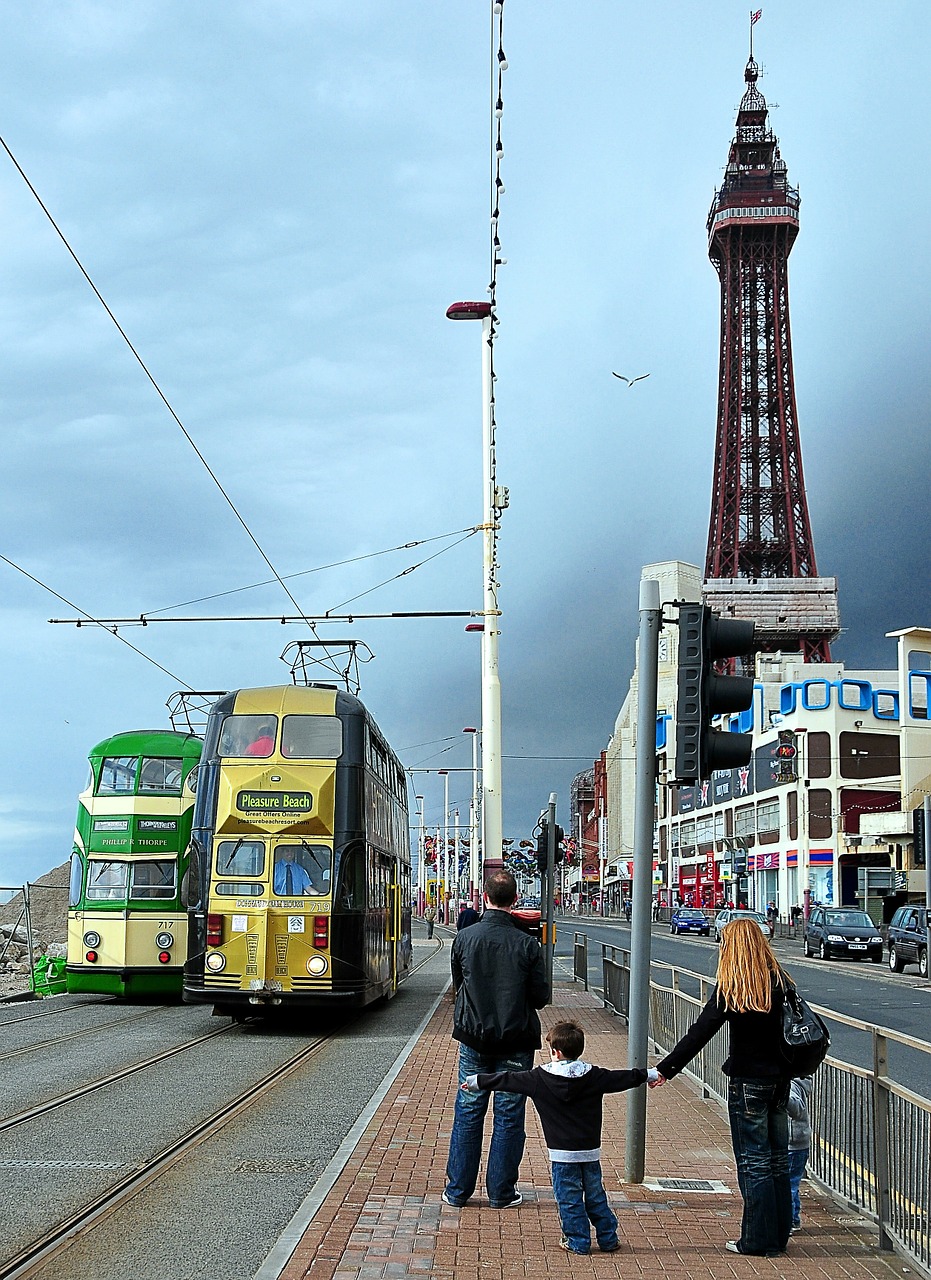 Child holding out his arm to catch a tram in Blackpool by digihanger on Pixabay
