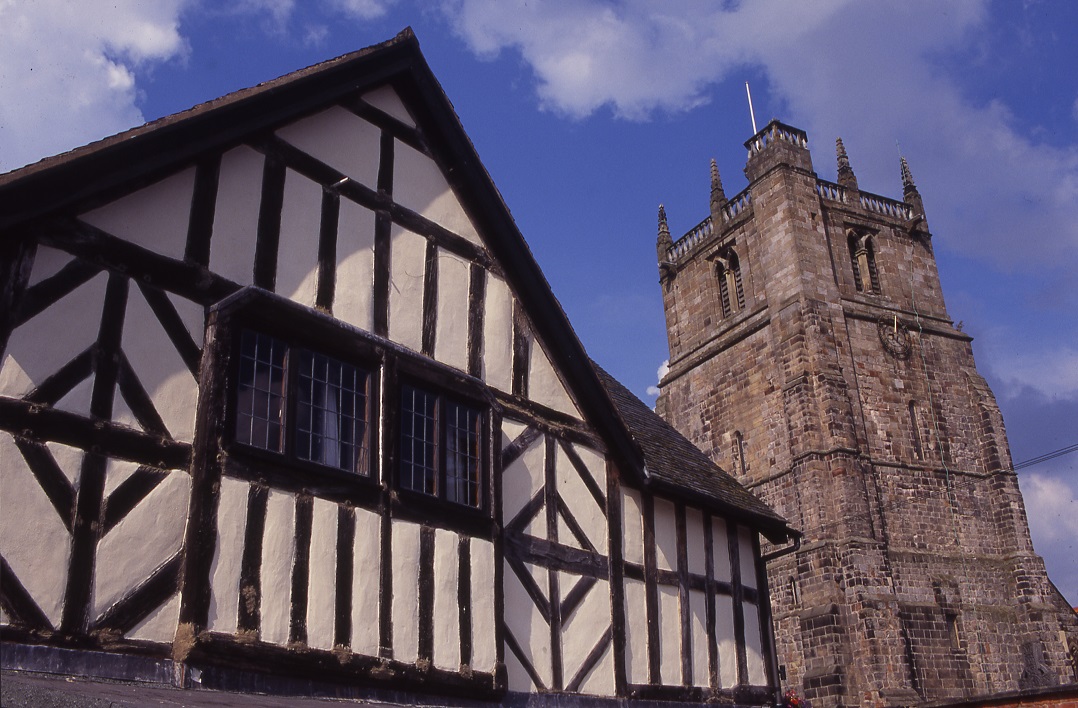 St Oswalds tower next to a timber-framed building © Shropshire Tourism