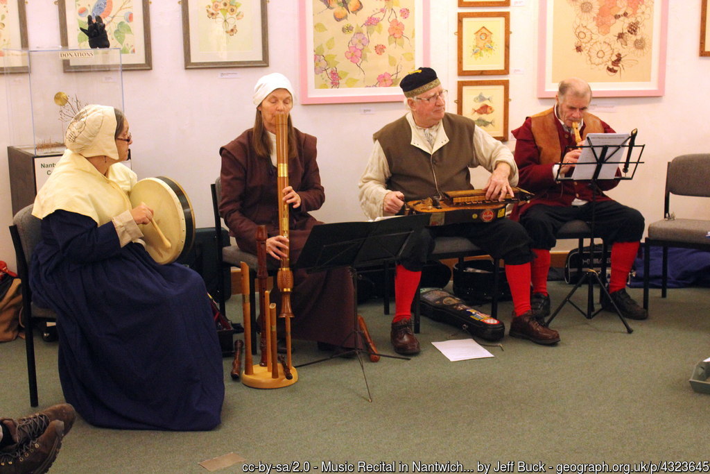 A groupp playing ancient musical instryments at the Holly Holy Day event
