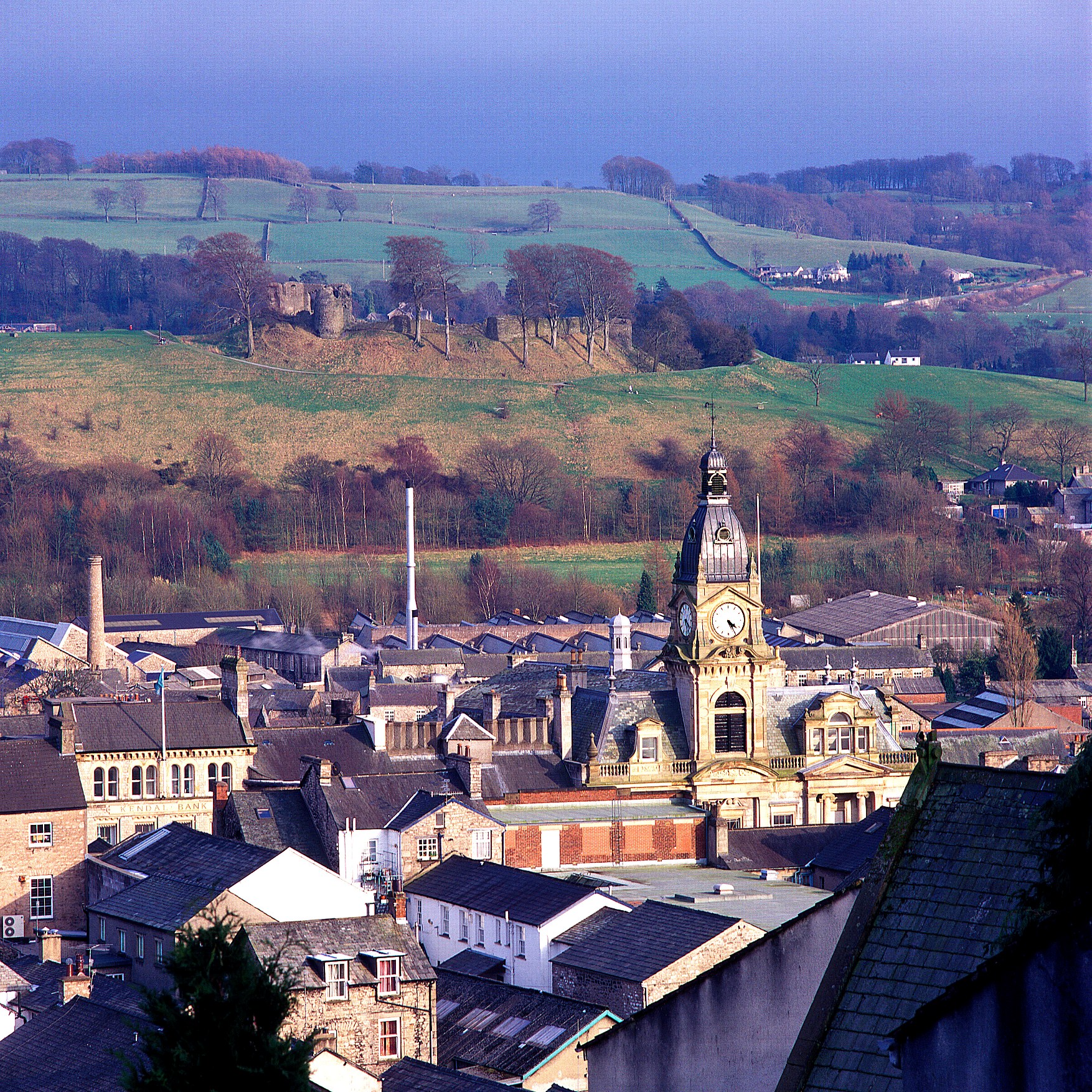A view across the roof tops of kendal with the castle in the background © www.golakes.co.uk