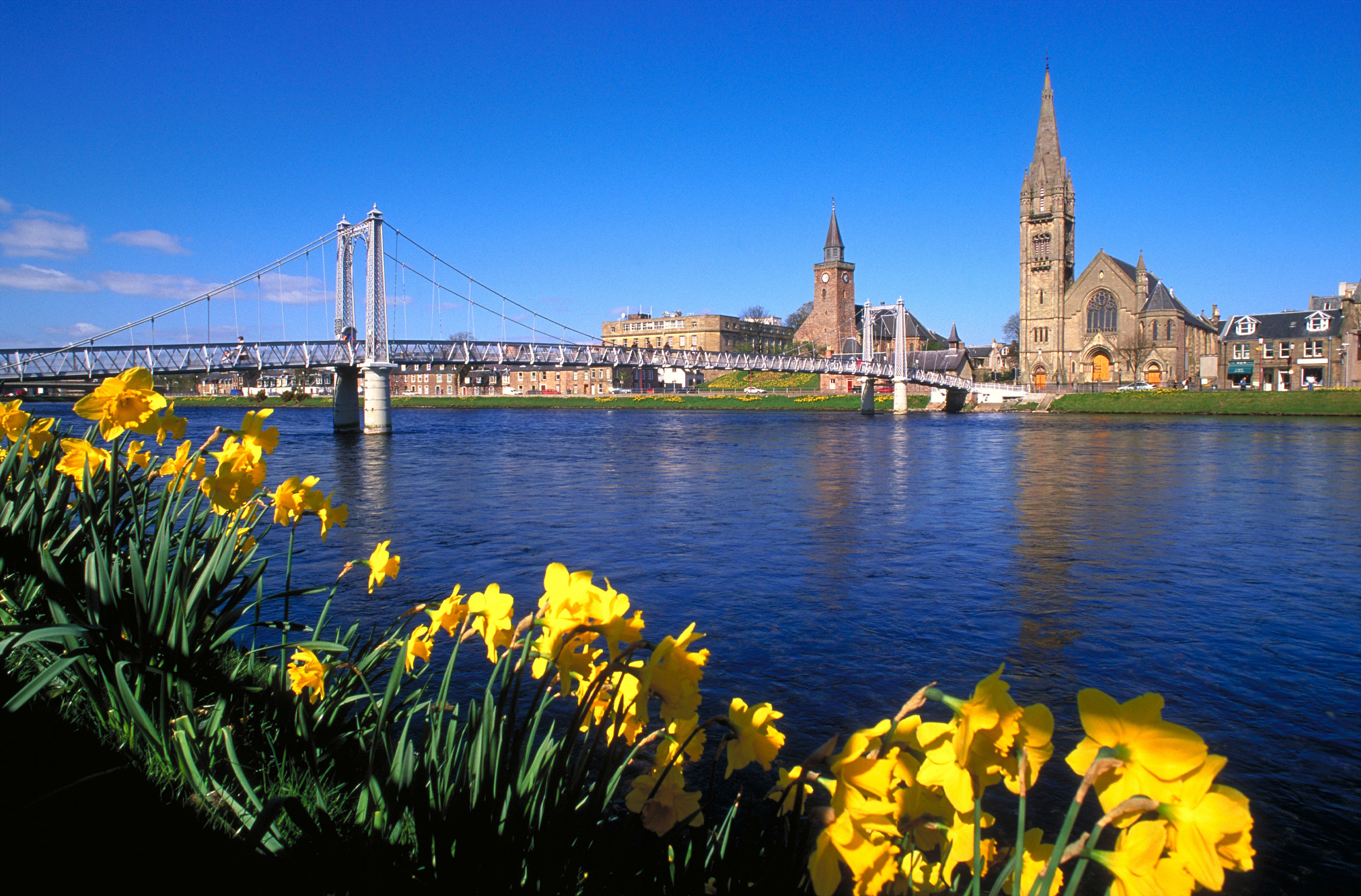 Foot suspension bridge and river Ness, Inverness, Highland, Scotland. ©VisitBritain / Britain on View